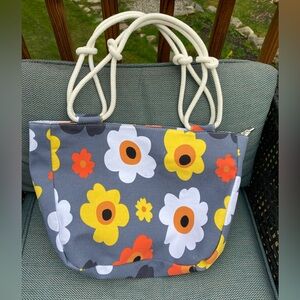 NWOT. Farmhouse gray/orange/yellow flowered tote with adorable rope straps.